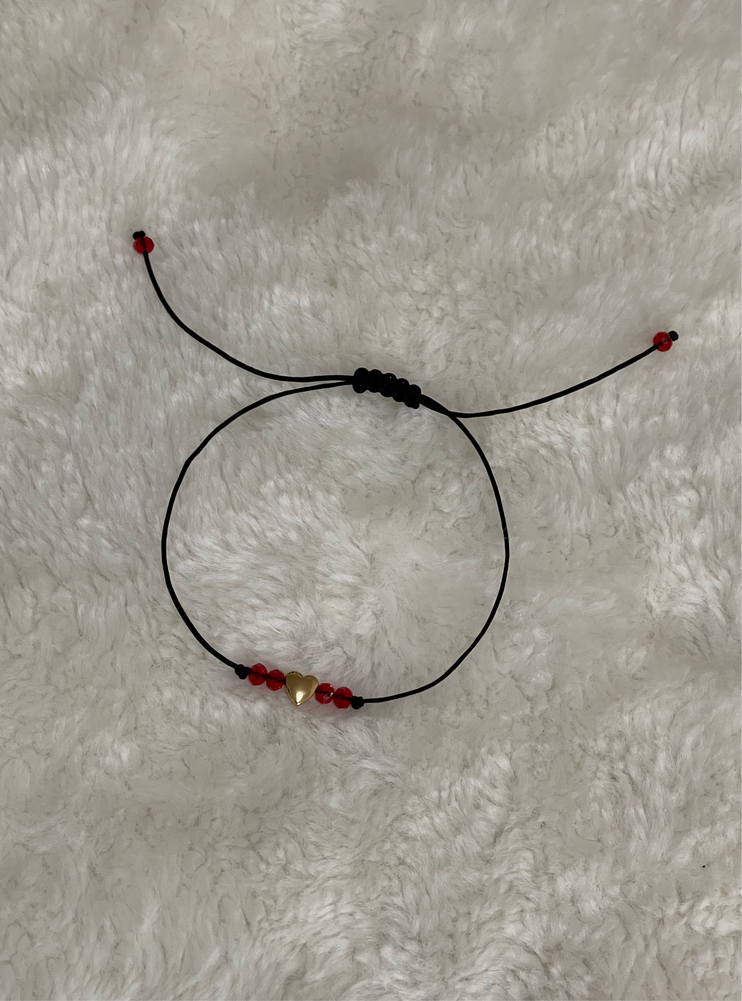 Pulsera corazón en macrame